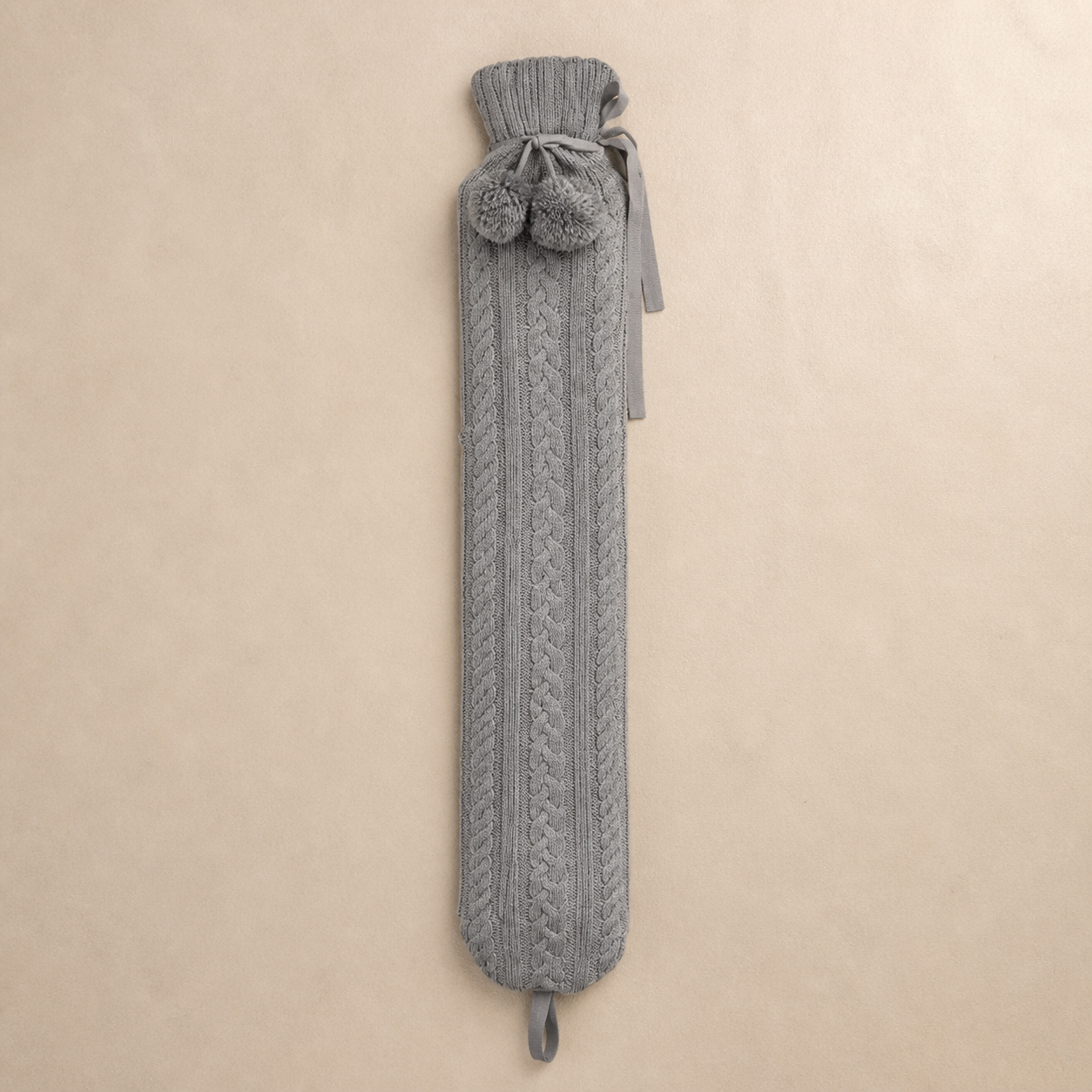 Bouillotte longue à housse tricotée